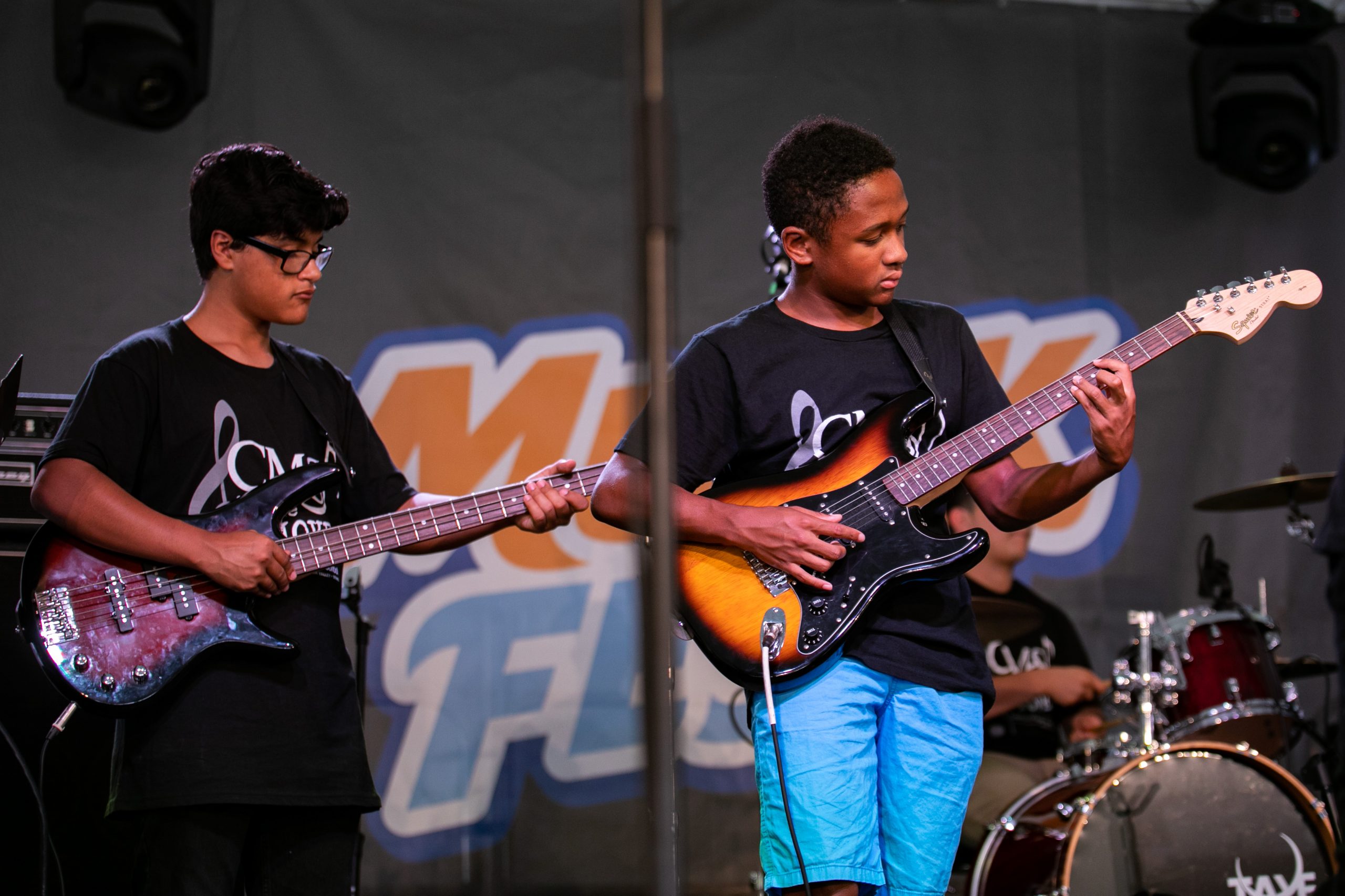 Community music school guitar students perform at musikfest