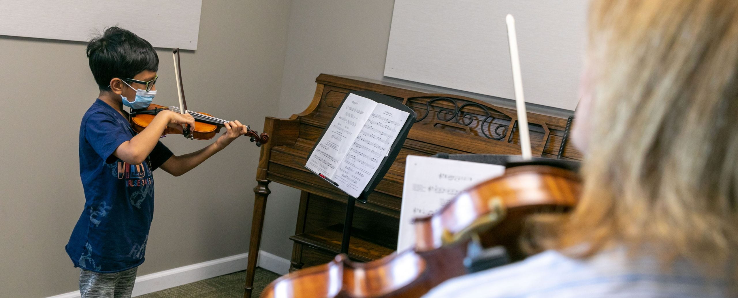 Community Music School - Sid Chitta takes lessons on the violin from teacher Linda Kistler.