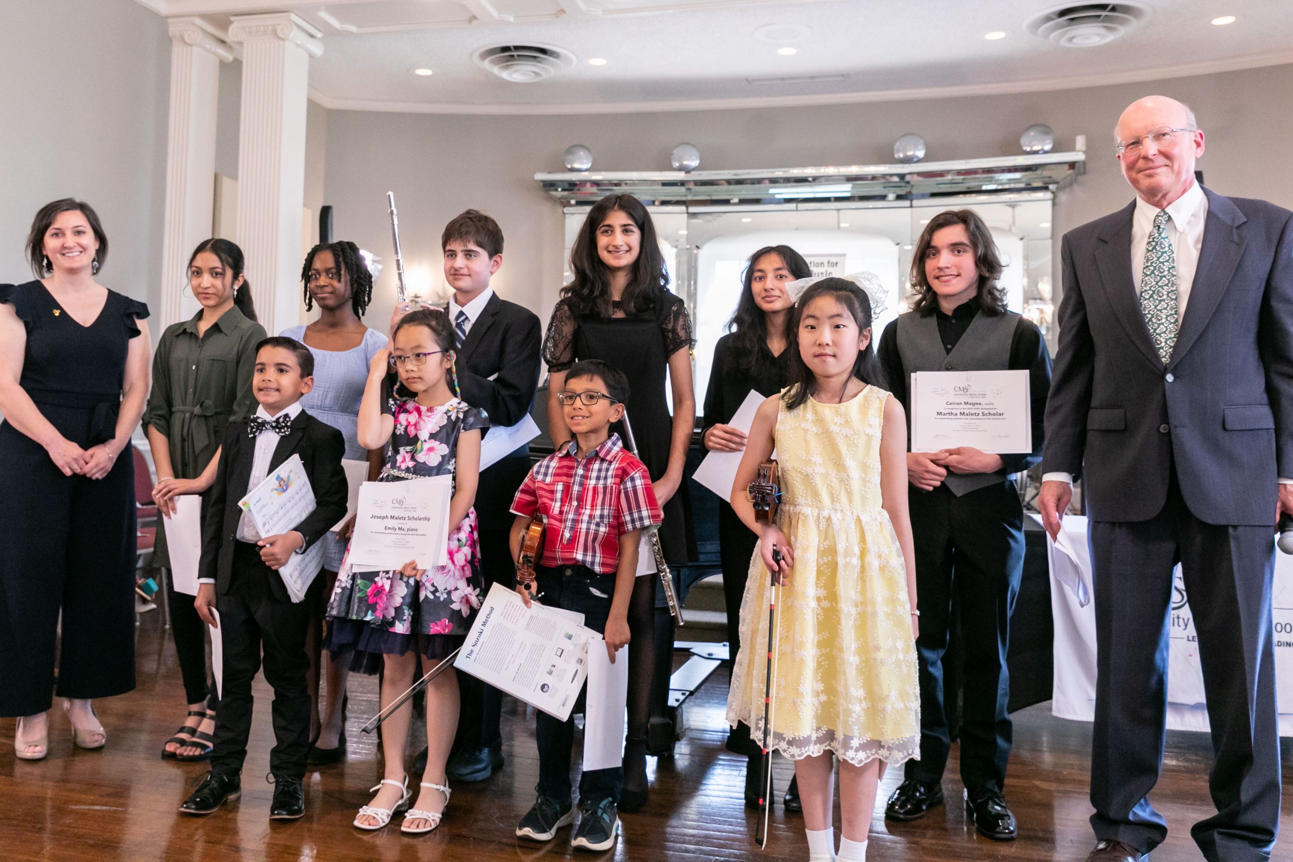 On Sunday, May 21, 2023, Community Music School (CMS) held the annual Gala Recital & Scholarship Awards in the Dorothy H. Baker Recital Hall at CMS. Pictured are CMS Executive Director Jeff Reed (far right) and CMS Assistant Director Lisa Kulp (far left) with the 2023 Gala Scholarship recipients: (front l-r) Sebastian Santiago, Emily Ma, Siddharth Chitta, Rene Kim, (back l-r) Maanya Gope, Harmony John, Isaac Sharma, Aanya Sharma, Shriya Chitta, and Ceiran Magee.