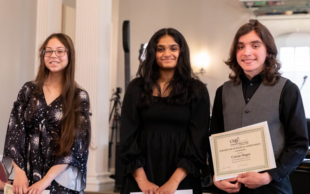 CERTIFICATE OF ACHIEVEMENT IN PIANO 2023 recipients announced. Three CMS teenage students pose with their certificates after the Year-End Recital